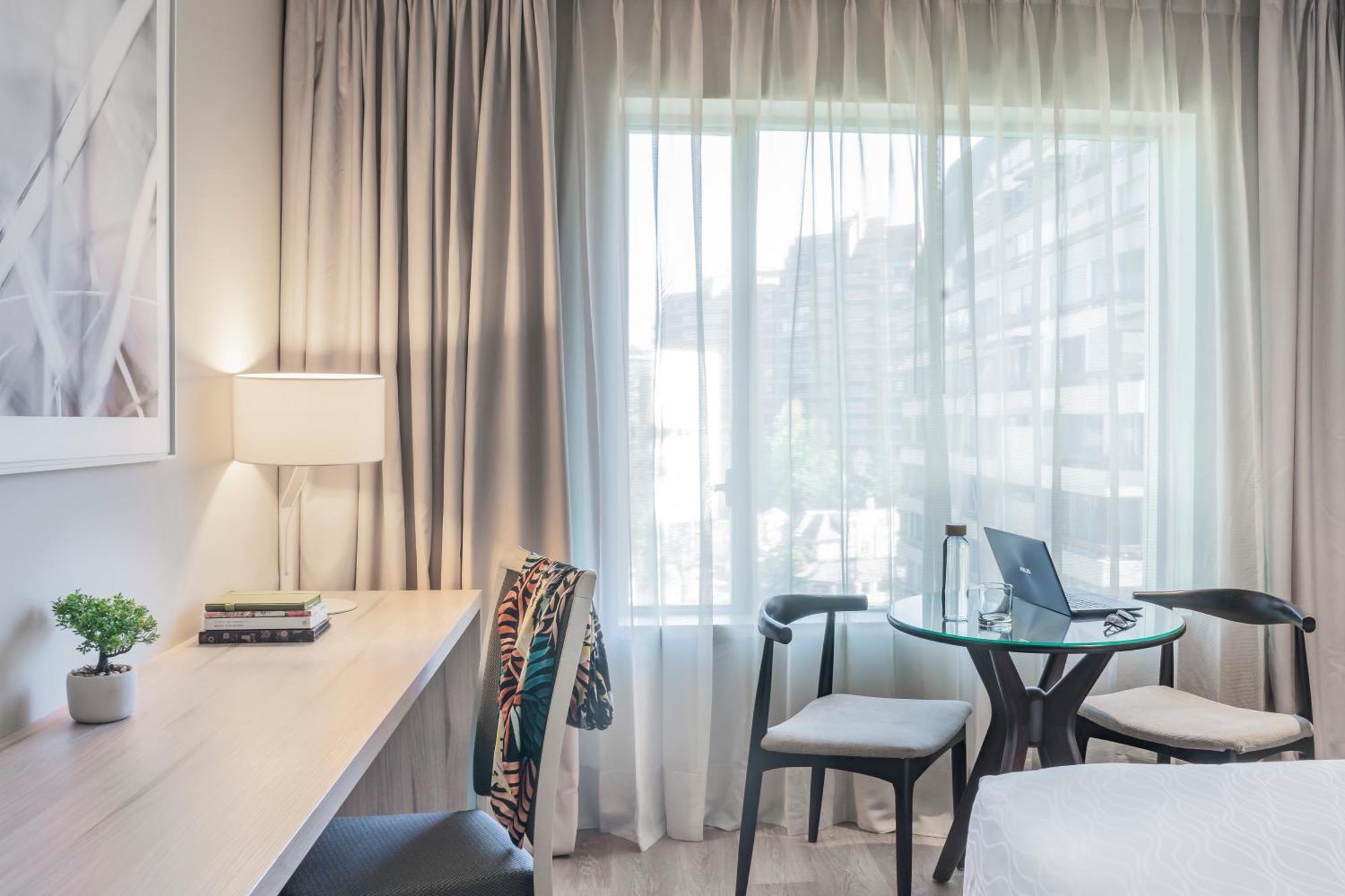 Pullman Santiago Vitacura المظهر الخارجي الصورة A room at the hotel